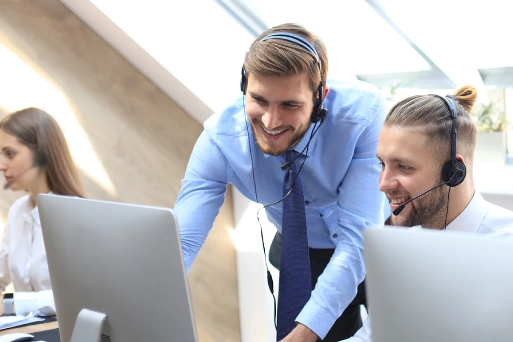 2 Computer engineers providing tech support