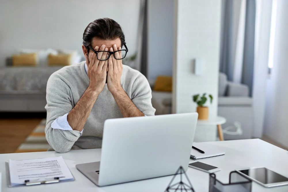 Business owner with headache