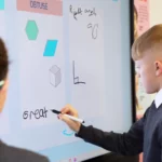 Students using Promethean panel enjoying engaging, modern Lessons
